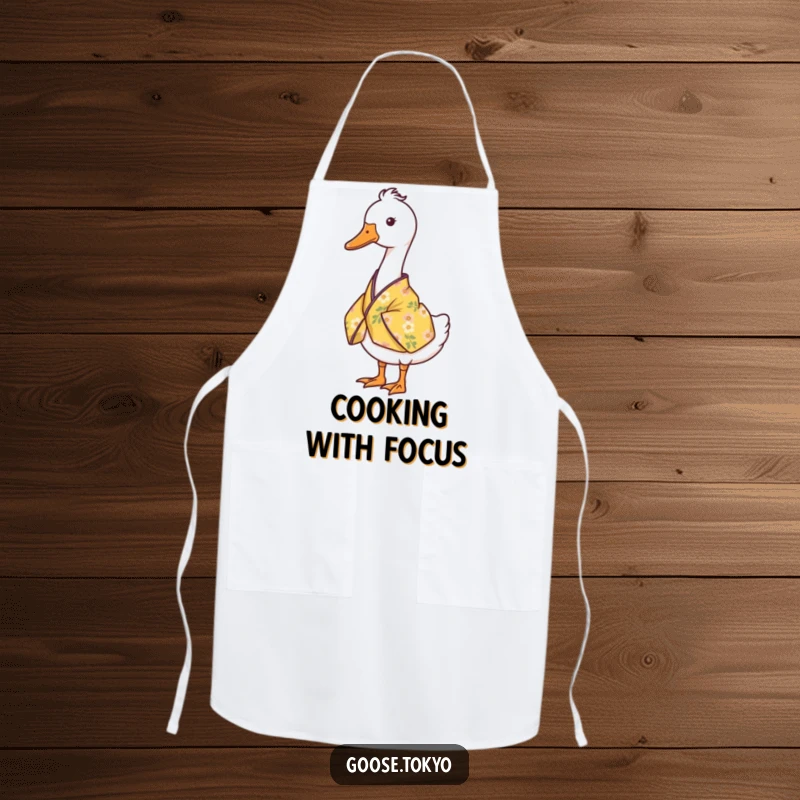 Funny goose apron with a serene goose standing still in a yellow floral kimono, ideal for graceful cooking.