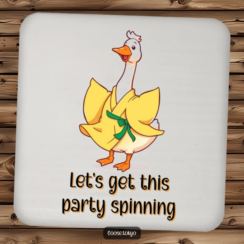 Funny goose drink coaster, a happy goose in a flowing yellow kimono joyfully twirling, protecting surfaces with style and humor.