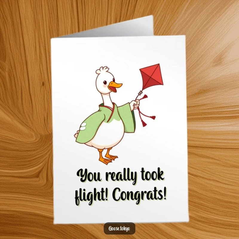 Funny Free Printable Congratulations Card: A charming goose in a green kimono twirls a kite in celebration.