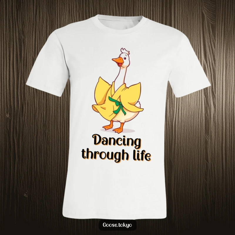 Funny goose t-shirt, a happy goose in a vibrant yellow kimono joyfully twirling, with the fabric flowing dynamically around it.