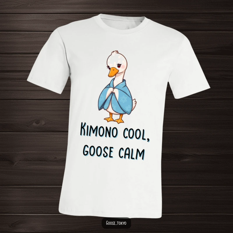 Funny t-shirt showcasing a dignified goose adorned in a blue patterned kimono, executing a gentle bow. Unique and chic.